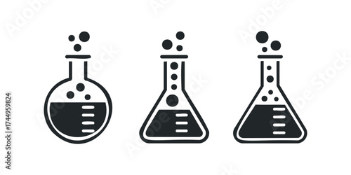 Three laboratory flasks with bubbles