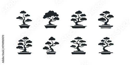 Collection of eight stylized bonsai tree silhouettes