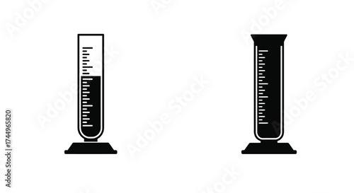 Two laboratory graduated cylinders one nearly empty one mostly full