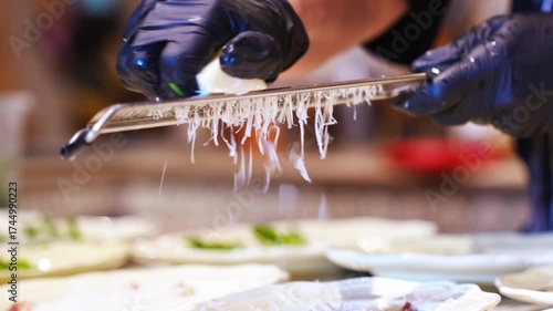 Preparing delicious cheese for tacos in a busy kitchen