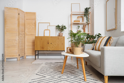 Cozy sofa, coffee table and...