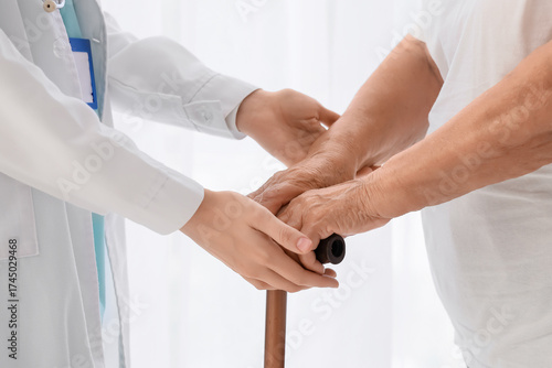 Female doctor and senior wo...