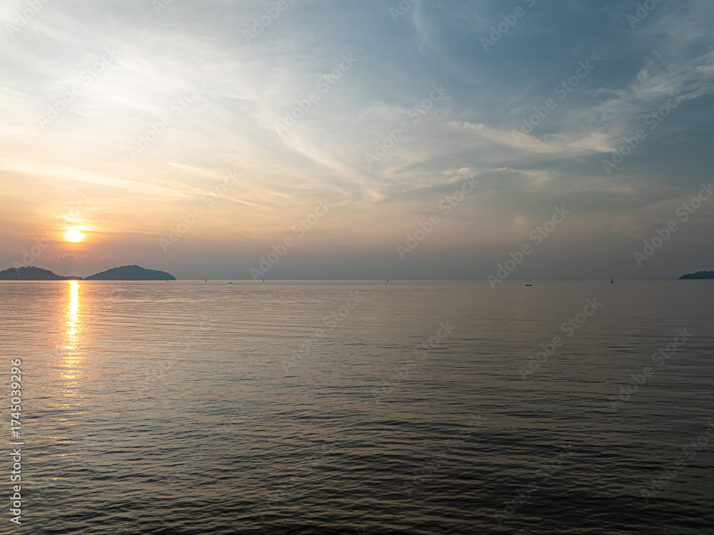 Fototapeta premium Beautiful sky sunset or sunrise clouds over sea nature background