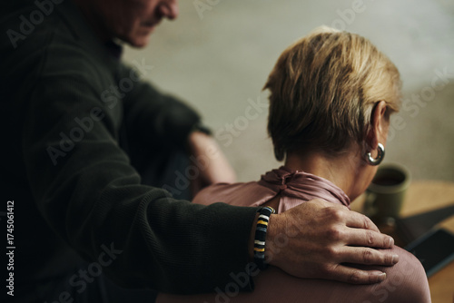 Quadro em tela Senior Caucasian man comforting wife or female friend or relative by placing han