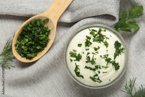 Bowl of tasty sour cream wi...