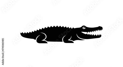 Simple black alligator silhouette vector icon.