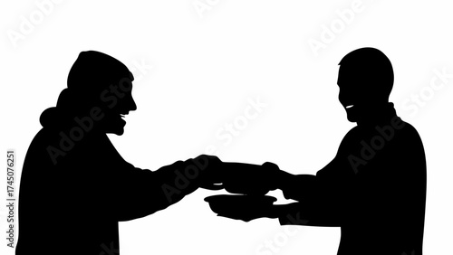 Two people sharing food with smiles, representing generosity and community connection