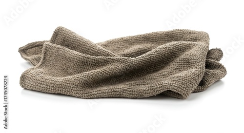 Crumpled gray terry cloth rag resting on a clean white surface