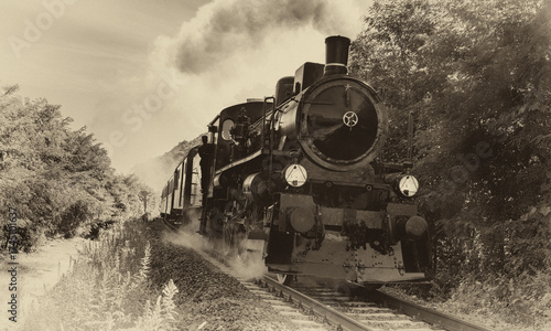Old steam locomotive in sepia vintage style