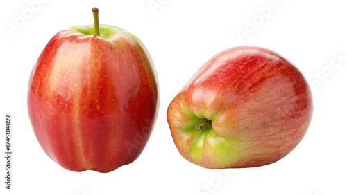 Two ambrosia apples isolated on transparent background, close up studio shot