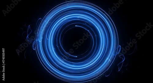 Abstract blue light trails forming a circular pattern against a black backdrop