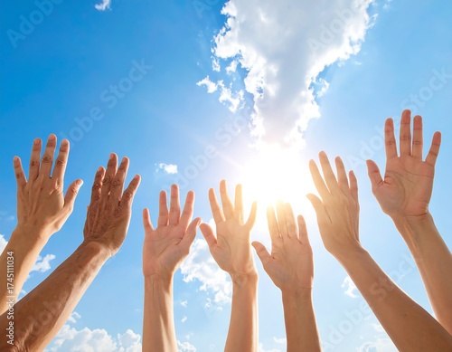 People raising their arms towards a bright, sunny sky