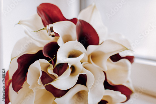 bouquet of flowers with wedding rings, close up