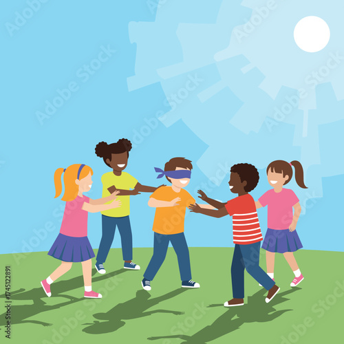 Children playing a fun game of blind man's buff in the bright sunshine on a grassy field.