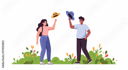 A woman and a man stand in a field of flowers tossing their hats in the air in a joyful celebration.