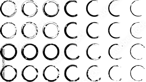 Arrangement of distressed black circles and c shapes in a grid pattern on a white background