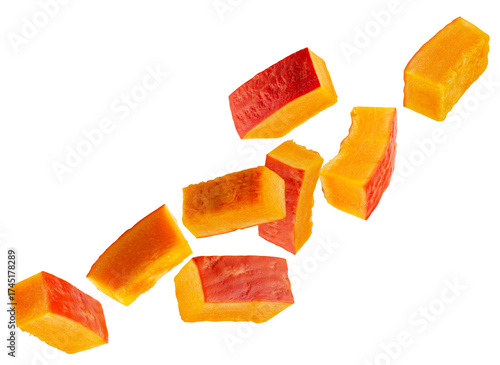 Rectangular slices of red pumpkin fly through space forming a chain. Isolated on white.
