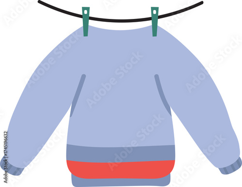 Blue sweater hanging drying on clothesline
