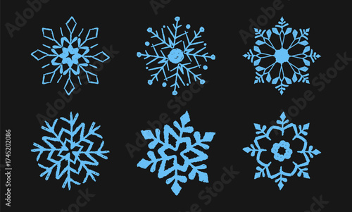 Set of cute blue Xmas snowflakes drawn in pastel, crayon, chalk, and charcoal textures. A holiday collection for kids featuring frozen, grunge style Christmas crystal squiggle art. Vector illustration