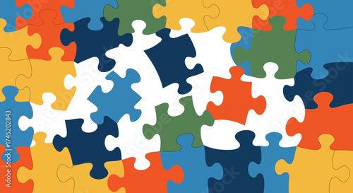 Colorful jigsaw puzzle pieces fitting together representing teamwork and collaboration.