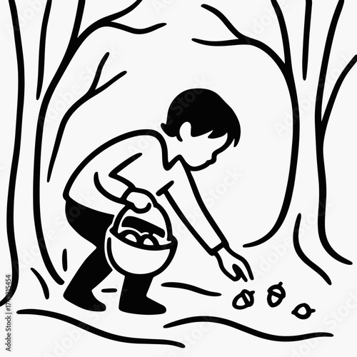 Child collecting acorns in woods