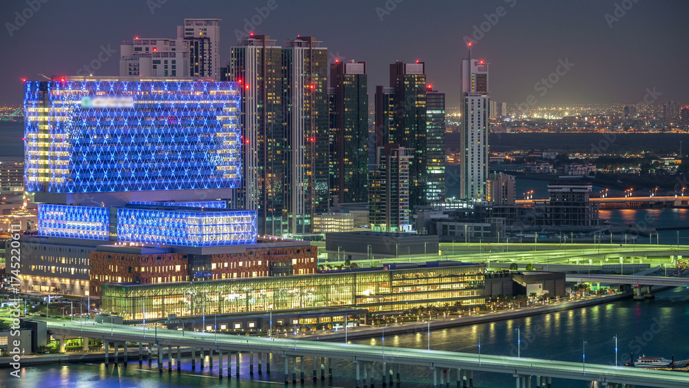 Obraz premium Aerial skyline of Abu Dhabi city centre from above day to night timelapse