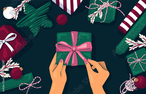 Merry Christmas, Happy New Year. Gift giving. Holiday season banner top view. Hands unpacking box, Decorative bow.