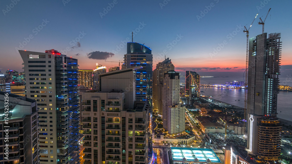 Fototapeta premium JBR and Dubai marina after sunset aerial day to night timelapse
