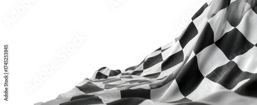 A close-up of a checkered flag billowing in the wind, with a black background