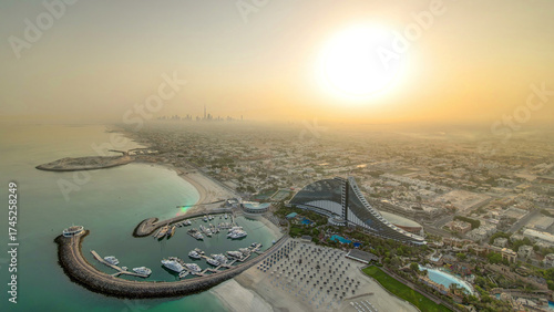Sunrise. Aerial View of kite beach from helipad, Dubai, UAE timelapse