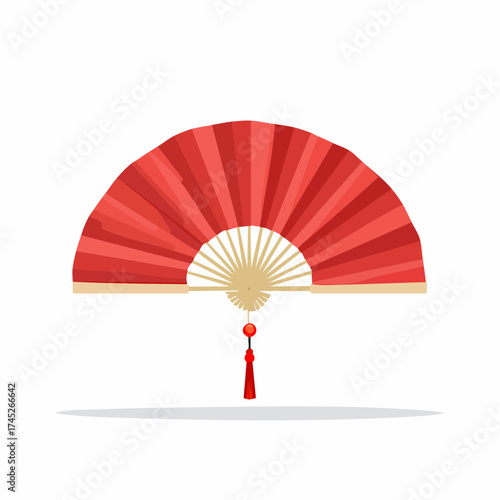 Red folding fan with tassel and shadow