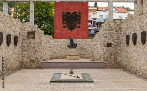 Interior of the Mausoleum of Skanderbeg in Lezhë, Albania, featuring the memorial statue, Albanian double-headed eagle emblem, and symbolic relics honoring the national hero.