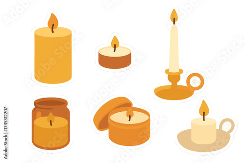 Collection of burning candles in various shapes including pillar, tealight, and classic holder