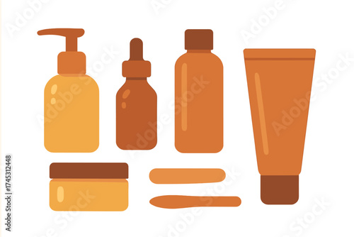 Assortment of cosmetic and skincare product containers in warm earth tones