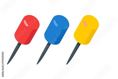 Three colorful push pins in red, blue, and yellow