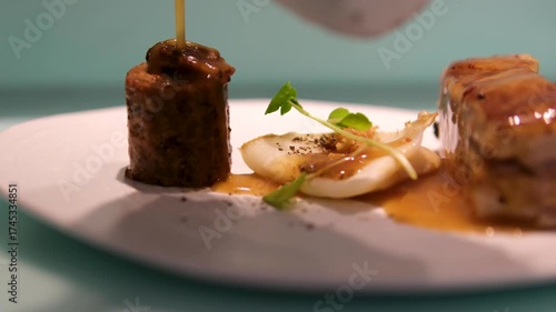 dishes of haute cuisine presentation serving details in dishes. chef hands put shrimps on plate. close up white plate in restaurant. food in Michelin restaurant. modern cooking technology