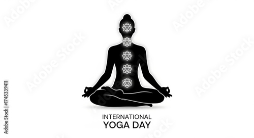 Silhouette of woman in lotus position with glowing chakras for international yoga day celebration, promoting wellness and mindfulness