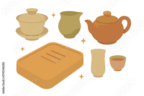Traditional ceramic tea ceremony utensils arranged on a draining tray