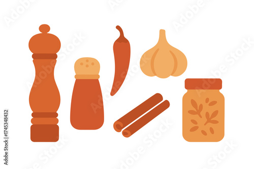 Essential kitchen spices and seasoning set including pepper mill, salt shaker, chili, garlic, and cinnamon
