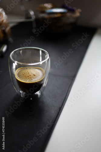 black coffee in a glass on the table