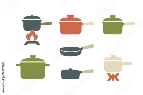 Set of kitchen cooking pots, saucepans, and frying pans with lids and handles