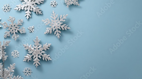 A blue background with a snowflake pattern