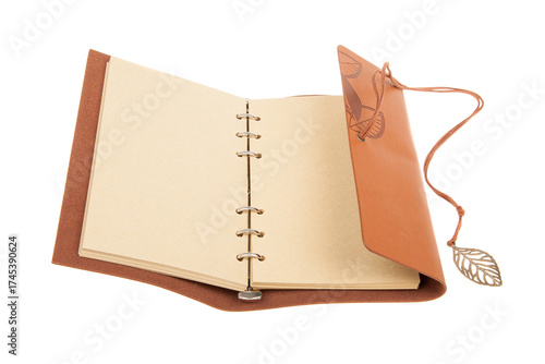 Open leather-bound journal with blank pages on white background. Handmade notebook for writing, sketching and creative planning