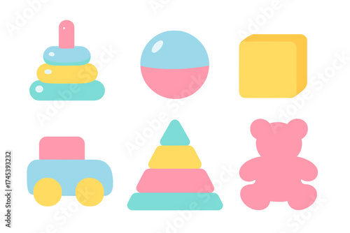 Pastel colored collection of classic baby toys including stacking rings and teddy bear
