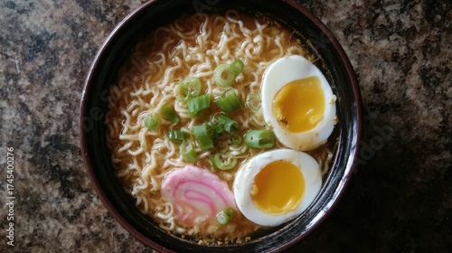 Delicious Ramen Bowl with Egg, Green Onion and Fish Cake Toppings