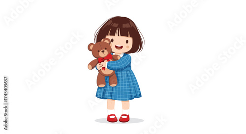 A little girl in a blue dress happily hugs her teddy bear.