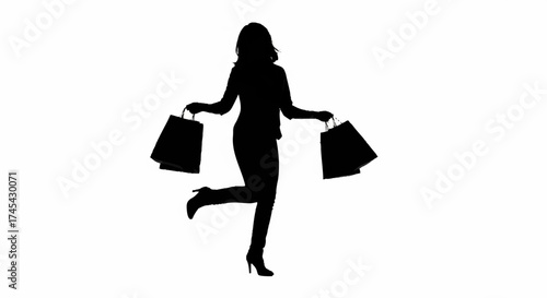 silhouette of woman with shopping bags