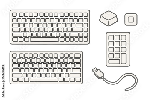 Isolated computer keyboard components set including layouts, numeric pad, keycaps, and USB cable
