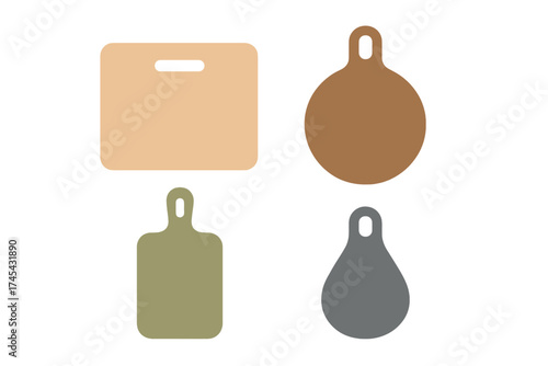 Four wooden cutting boards in various shapes used for kitchen food preparation