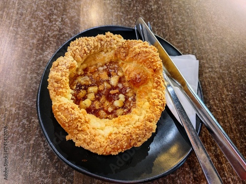 baked apple pie on a plate
